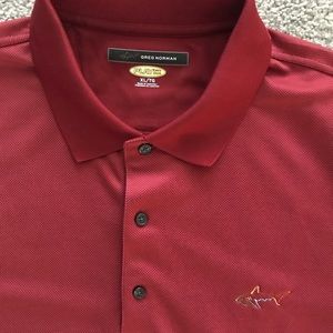 Men’s extra-large, Greg Norman rust colored golf shirt.